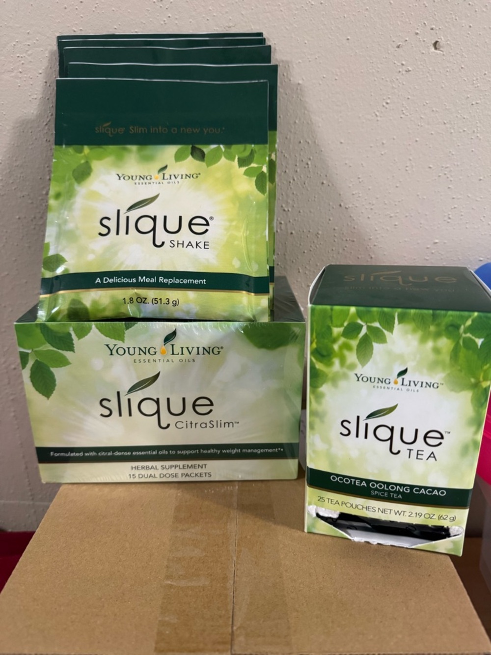 Young Living Slique Citraslim NIB, 26 Slique tea and 5 slique shake packets.